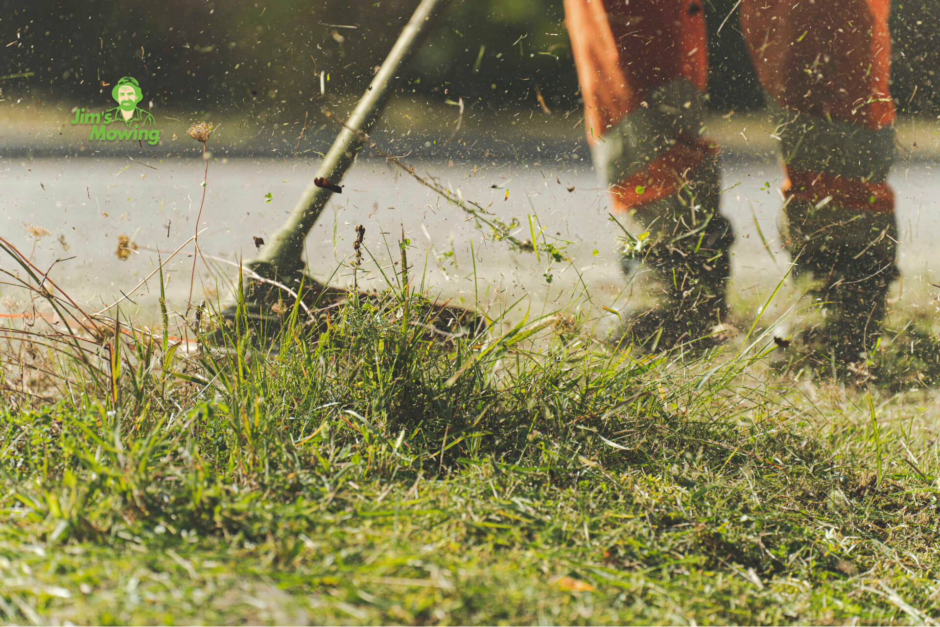 mowing overgrown lawn