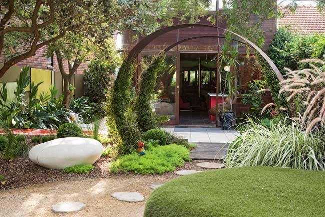 Jim's Mowing - Abstract Garden with Circular Archway