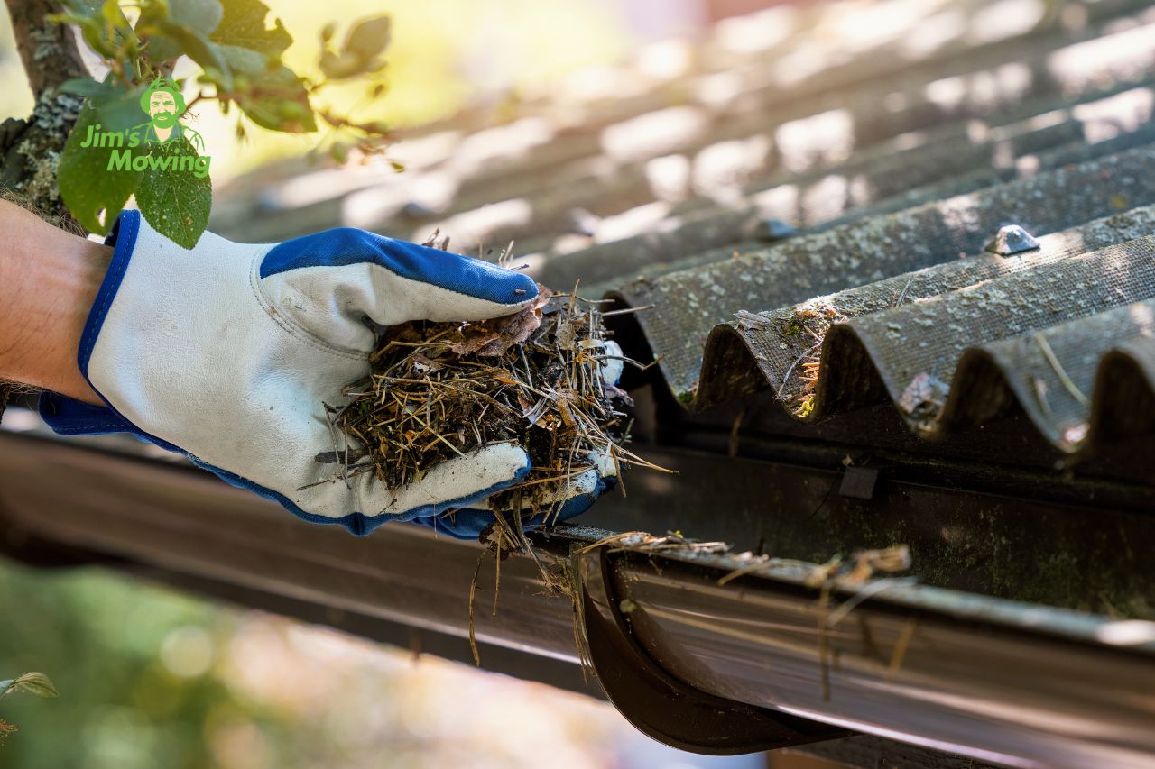 hand cleaning gutter